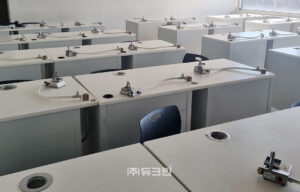 Dust collection from dental prosthetics and orthodontic device manufacturing